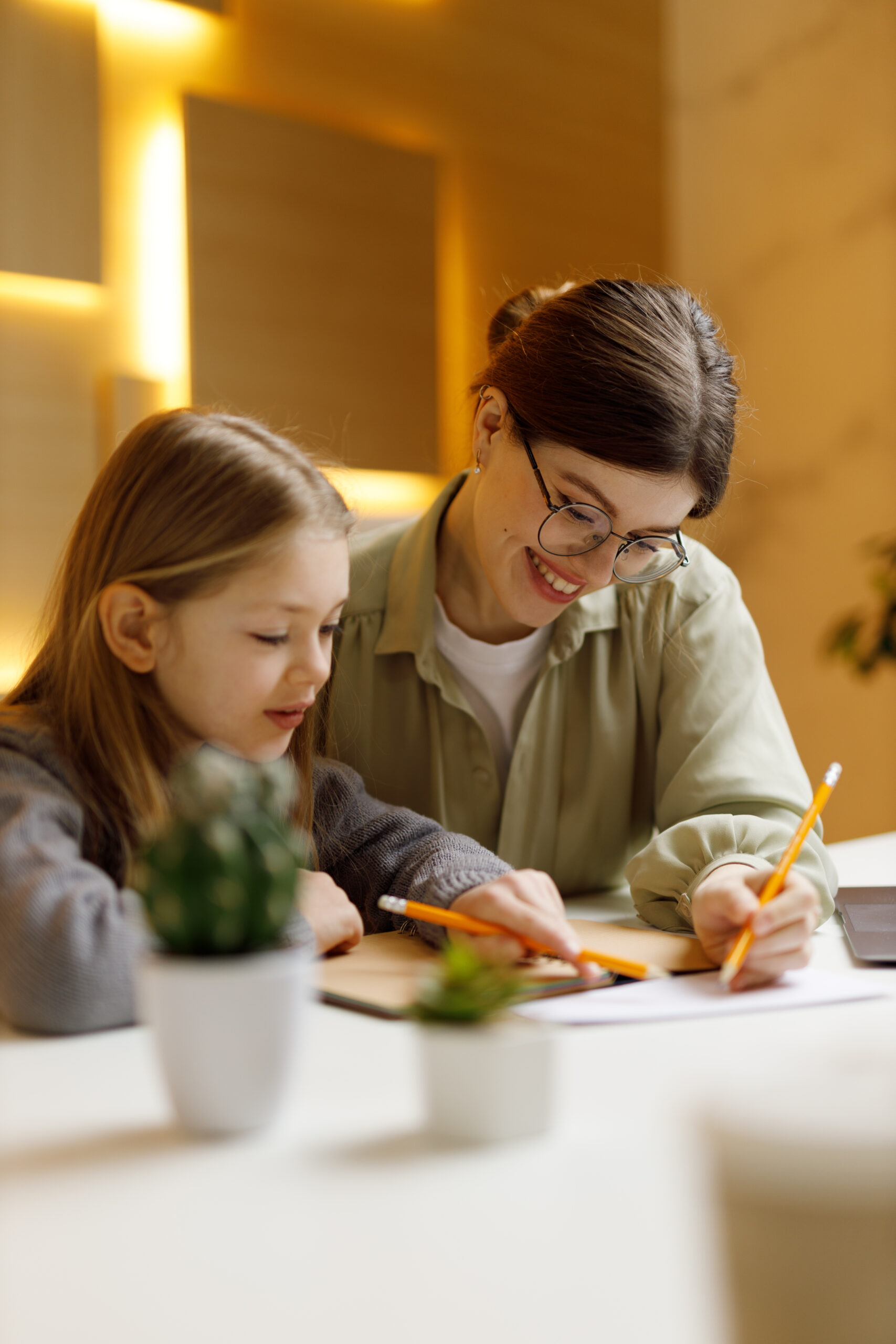 Back to school, individual lesson with a child. Vertical portrai